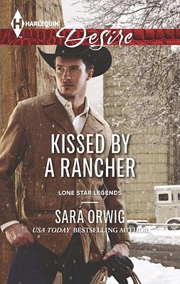 Cover image for Kissed by a Rancher
